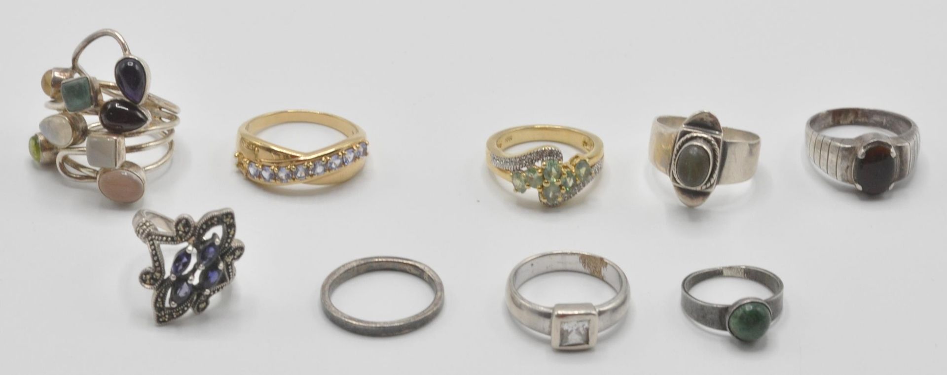 A collection of nine silver 925 rings most of them with precious stones. Total gross weight: 44g