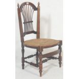 A 19th century Victorian antique oak bedroom chairs having rush seat with spindle back rest in a