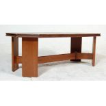 A vintage late 20th century teak wood tile top coffee table having hexagonal shaped top with brown