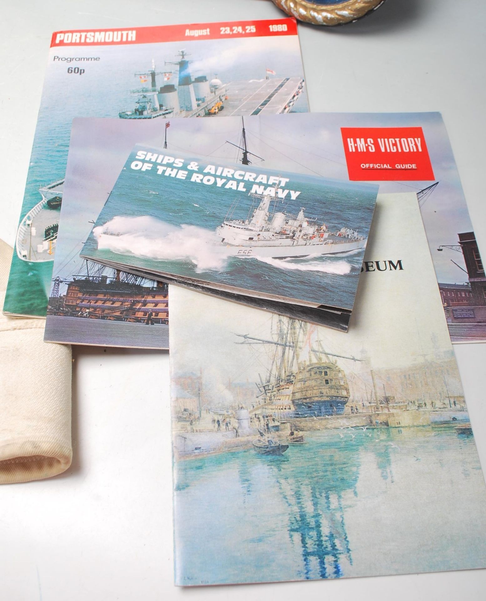 A group of Royal Navy / Naval related items to include a framed HMS plymouth painting on black, a - Bild 6 aus 7