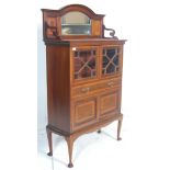 An Edwardian mahogany inlaid library bookcase vitrine - display cabinet. Raised tapering legs with