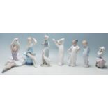 Lladro / Nao - A collection of five late 20th Century Lladro / Nao / Mediflor figurines to include a