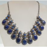 A stamped 925 silver North African / moroccan collar necklace set with blue lapis cabochons in