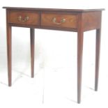 A 19th century George III mahogany writing table desk. The desk being raised on square tapering legs