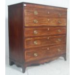 A 19th century George III mahogany and satinwood line inlaid secretaire bureau chest of drawers.