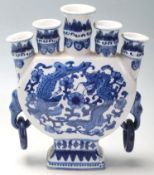 A 20th Century Chinese blue and white porcelain candlestick holder / candelabra having five scones