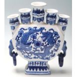A 20th Century Chinese blue and white porcelain candlestick holder / candelabra having five scones