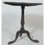 A George III 19th century country oak tilt top wine table / breakfast table. Raised on cabriole