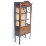 An Edwardian mahogany stencil decorated and inlaid china display cabinet - vitrine. The cabinet