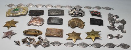 A collection of contemporary Americana / American belt buckles to include a Colt Revolver belt