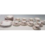 An early 20th century Aynsley fine english bone china tea service comprising of eight cup,saucers