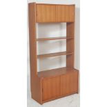 A retro vintage mid century teak wood wall unit / room divider by Gibbs having a twin sliding door