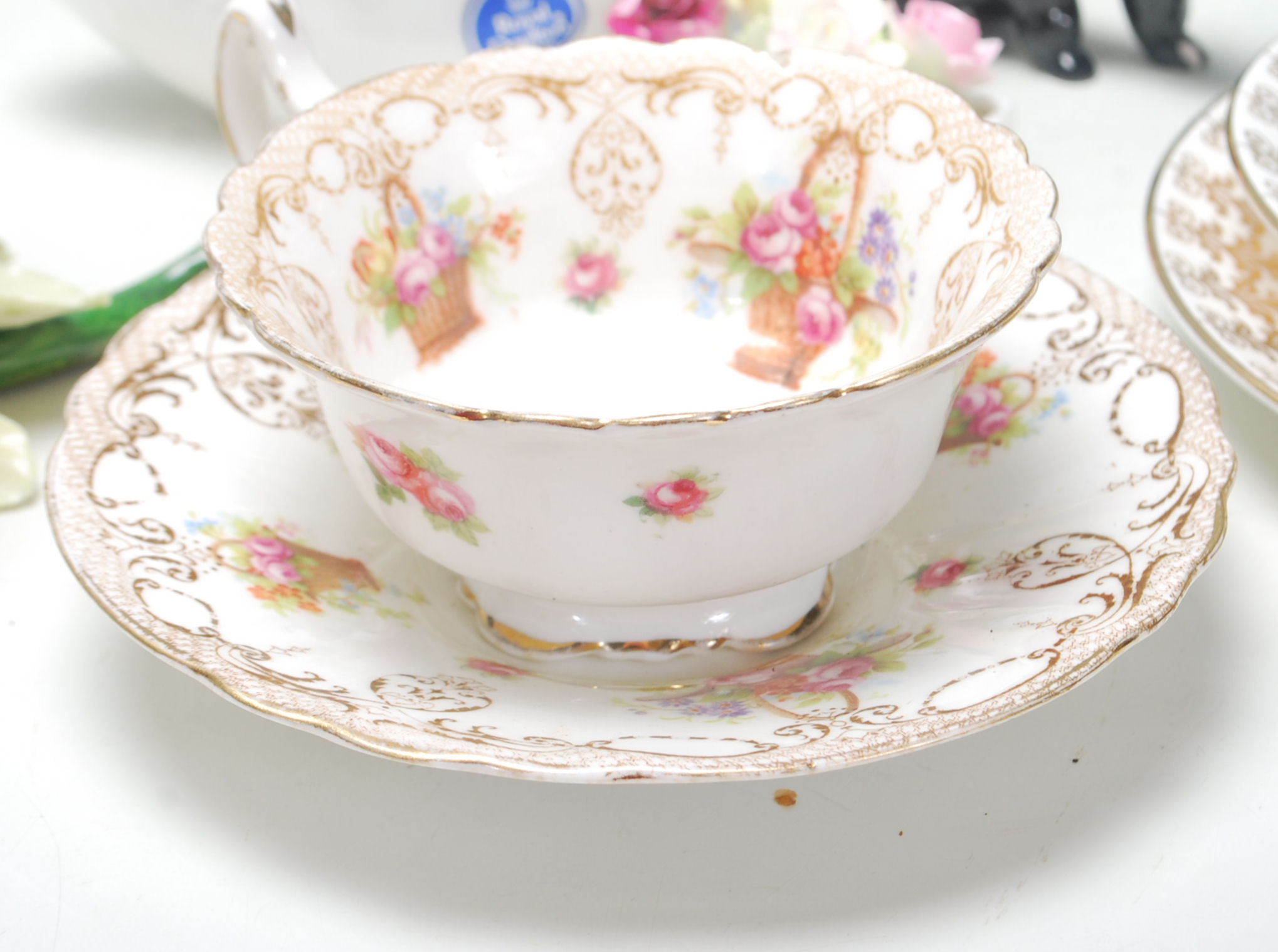 A collection of vintage early 20th Century fine bone china tea cups, trios and flower posies by - Image 8 of 15