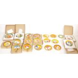 A Collection of 16 limited editions Wedgwood The Bizarre By Clarice Cliff living landscape plates to