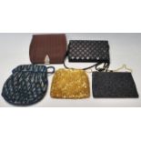 A group of five vintage retro ladies handbags to include a blue and grey beaded handbag, a gold