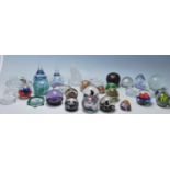 A large collection of 30+ 20th century studio art glass paperweights to include Darlington,