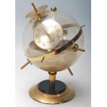 A vintage 20th century Huger Sputnik ES weather station, West German, incorporating a barometer,