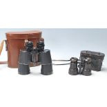 A pair of vintage Imperator 7 x 50 coated lens binoculars complete in brown leather case together