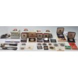 A collection of coins to include a selection of Great British commemorative crowns, Royal Navy