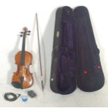 MUSICAL INSTRUMENTS: A Stentor II 4/4/ full sized electric classical violin complete with the bow