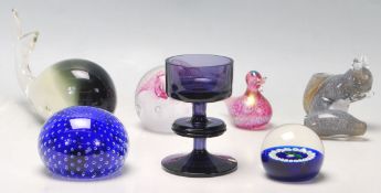 A collection of retro vintage 1980s glass paperweights to include Wedgwood, Murano & Langham