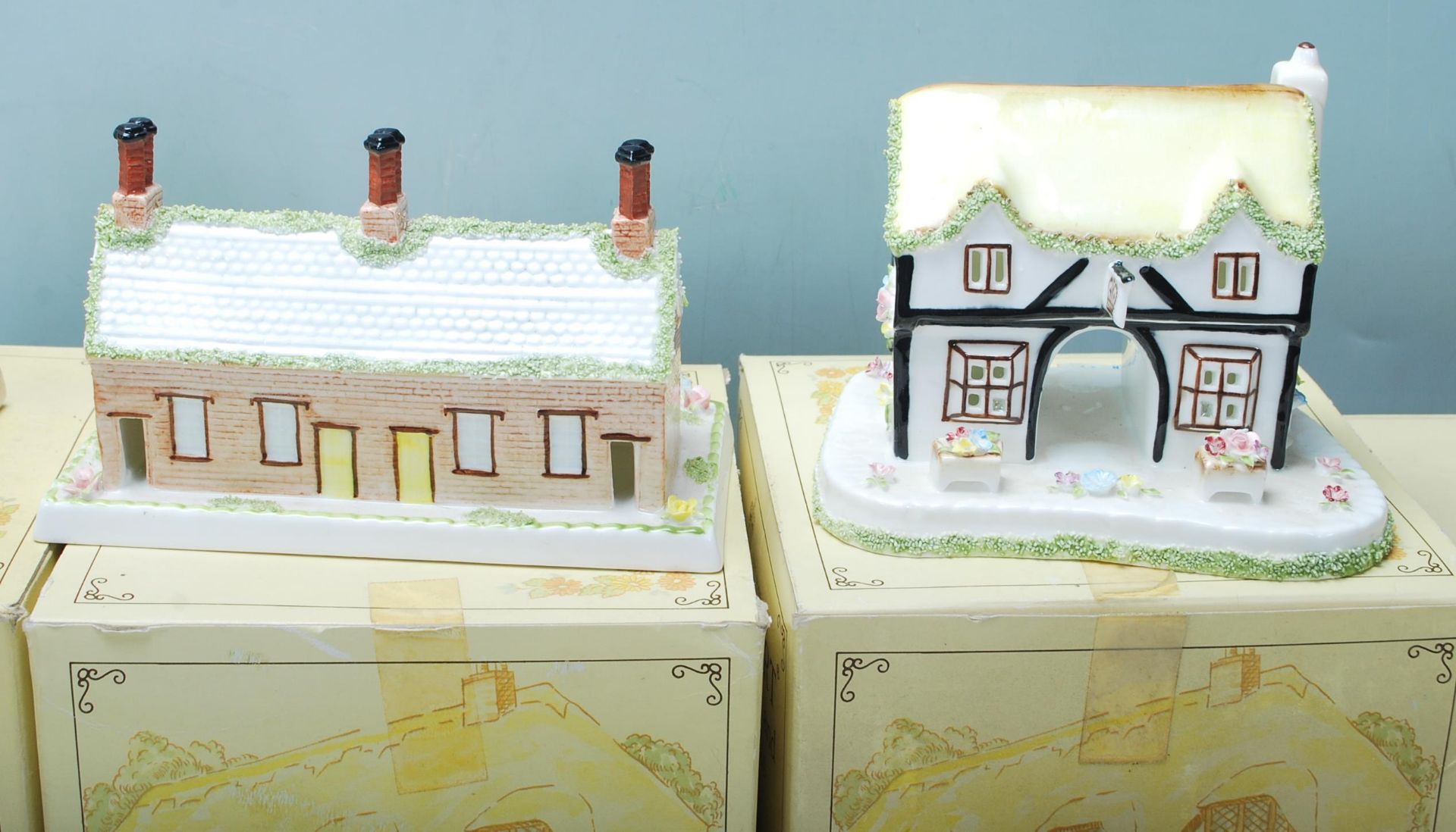 A collection of fine bone china cottages and florals by Coalport to include The Coaching Inn, - Bild 18 aus 20