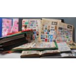 A large collection of vintage all-world stamp albums consisting of various albums being home made