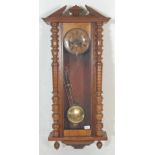 A early 20th Century Gustav Becker style German Vienna regulator wall clock, being oak cased with