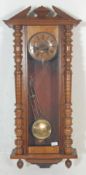 A early 20th Century Gustav Becker style German Vienna regulator wall clock, being oak cased with