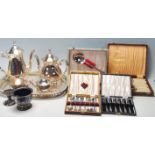 A good collection of 20th century silver plate boxed flatware sets and a boxed full four pice tea