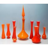 A mixed collection of retro vintage late 20th Century studio glass ware in burnt orange to include a