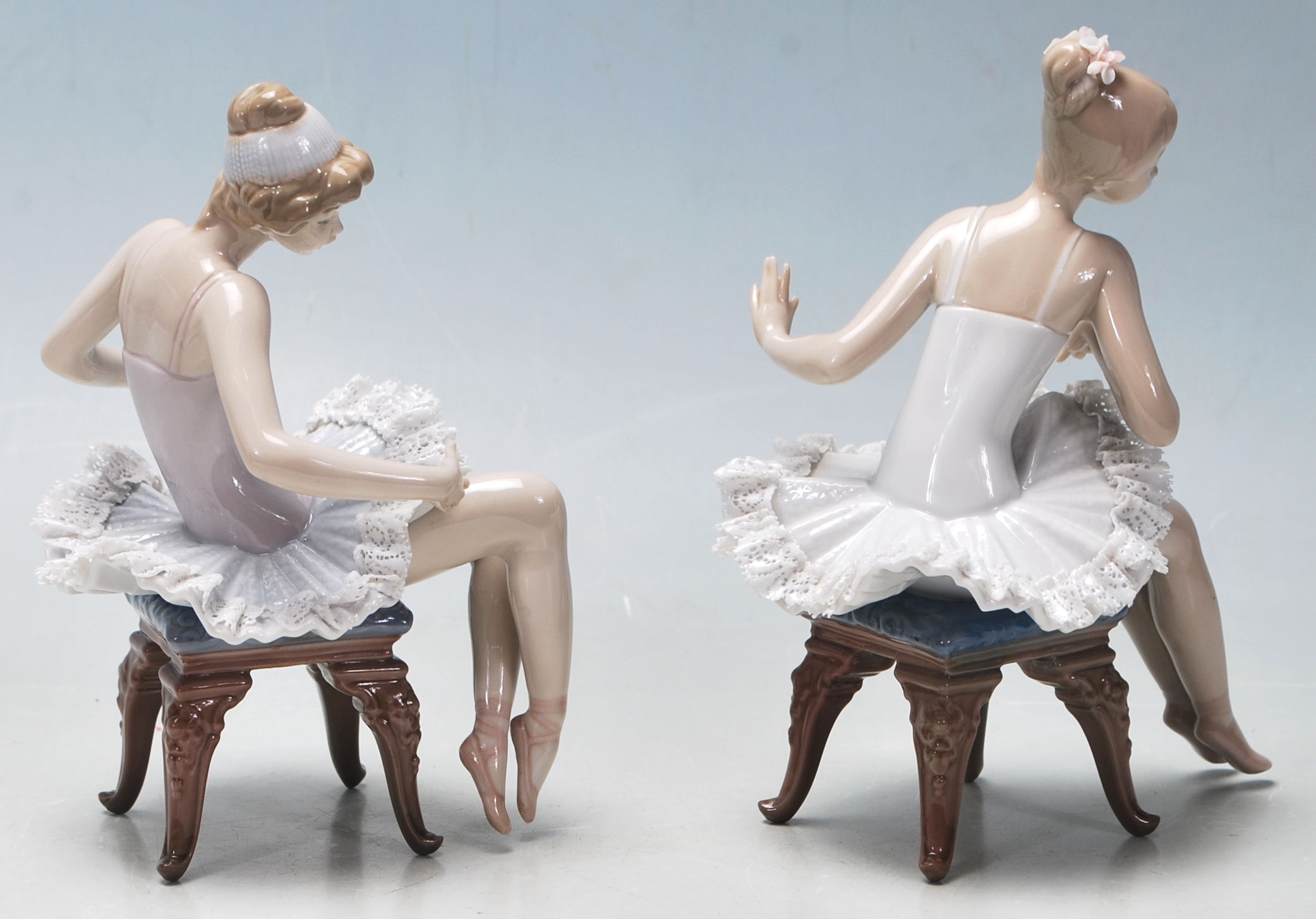 LLadro - A pair of late 20th Century vintage ceramic ballerinas comprising two seated girls getting - Image 2 of 6