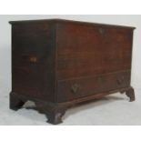 An 18th century country oak coffer chest trunk. Raised on bracket feet with short drawers under