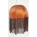 AN ORIGINAL 1960'S BIBA LAMPSHADE WITH SCALLOPED PANELS AND LONG FRINGE