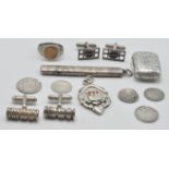 A collection of silver and jewellery items to include a silver hallmarked vesta case with