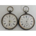 A pair of 20th century open face silver pocket watches having white dial with roman numerals and