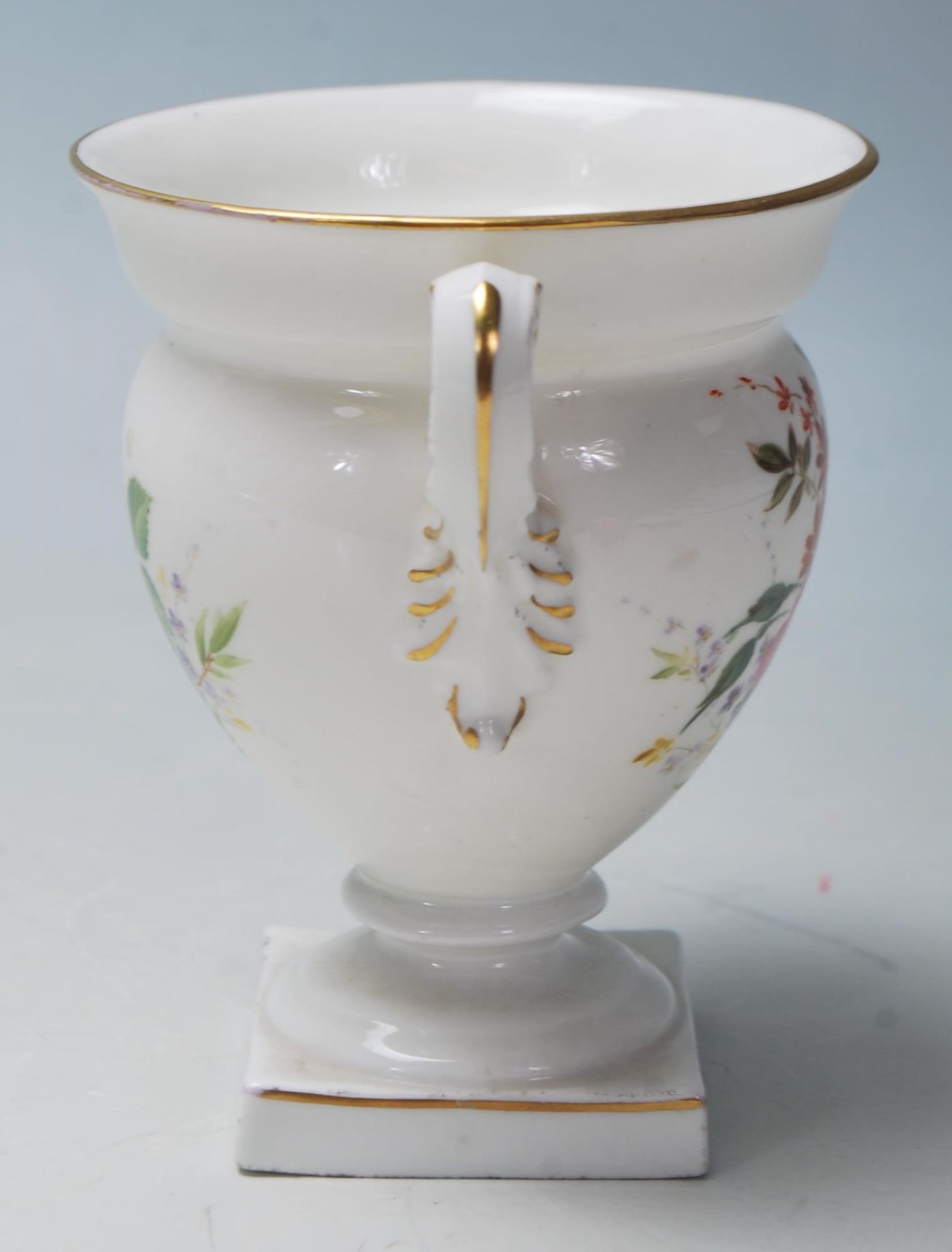 A Royal Worcester porcelain twin handled small vase urn with white ground having chintz foliate - Bild 2 aus 6