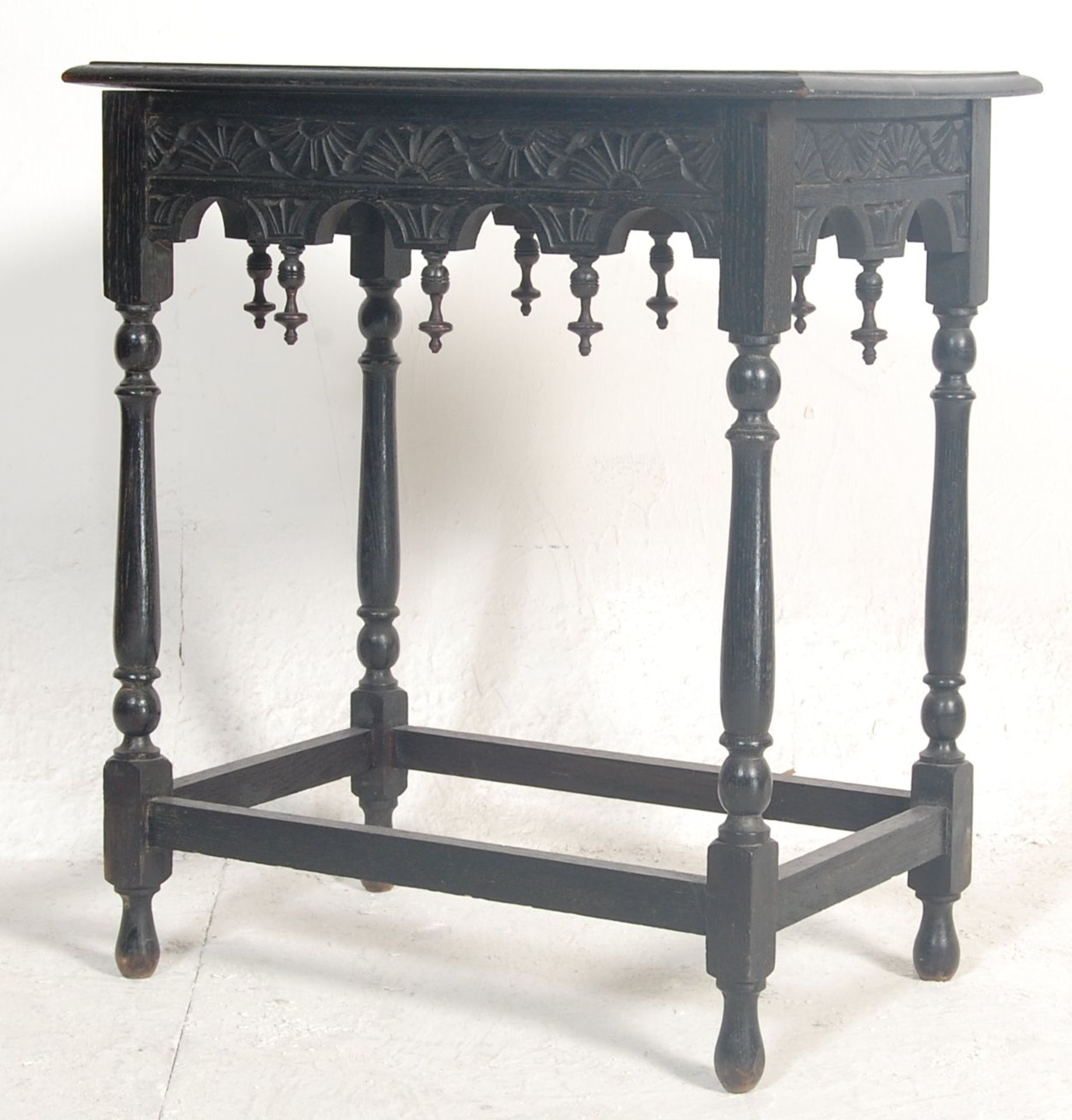 A 19th Century Victorian oak occasional / side table having a carved tabletop on a flared - Bild 4 aus 4