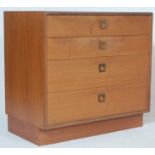 A vintage 20th century retro 1970’s teak wood chest of drawers. The chest having four graduated