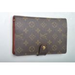 Louis Vuitton - An contemporary designer leather filofax having the iconic LV insignia to the