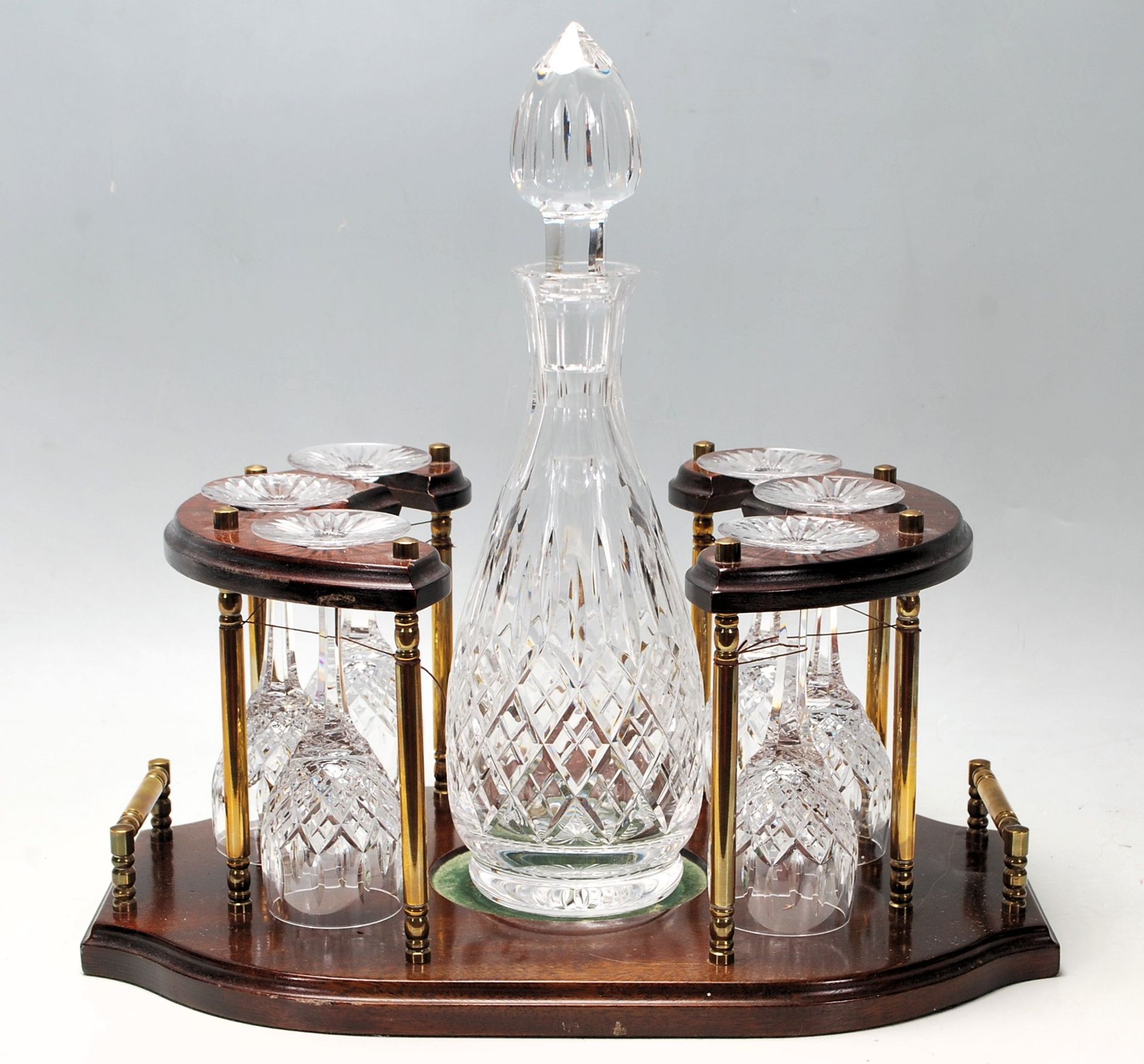 A 20th Century vintage cut glass decanter and glass set consisting of a bottle decanter complete