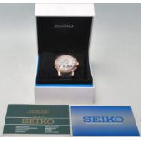 A cased Seiko gents Kinetic Chronograph wristwatch with rose gold plated case on stainless steel and