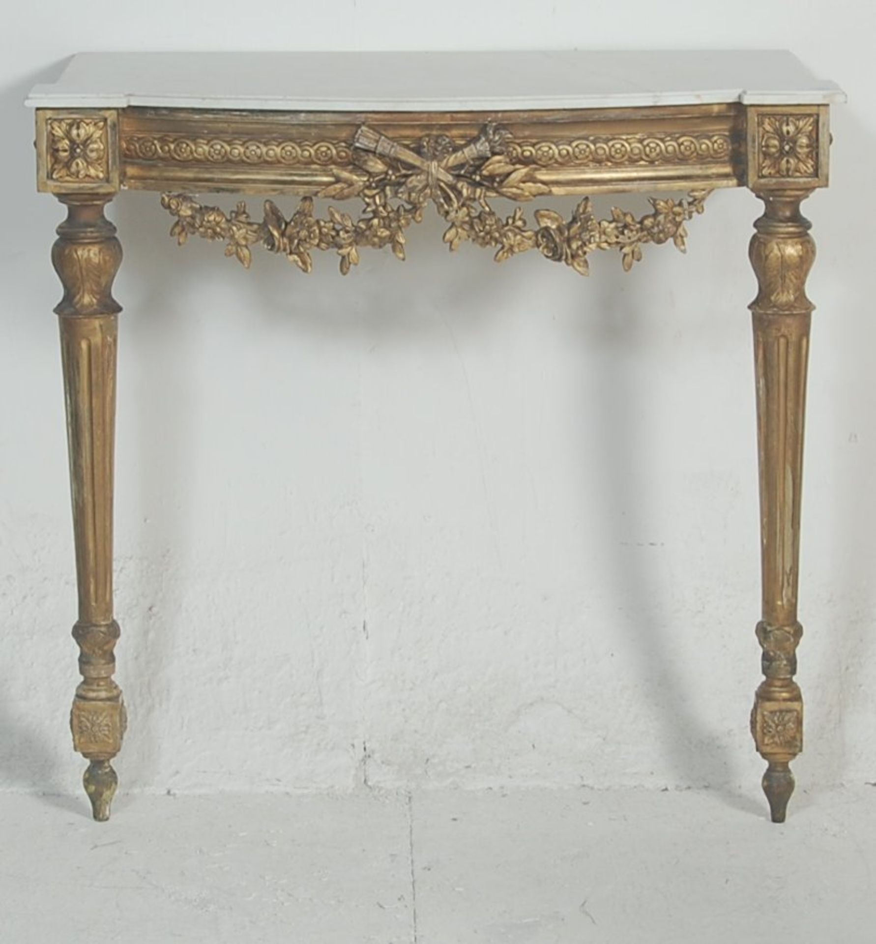 A 19th century French rococo marble and gilt wood console table. The hall / side table being