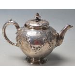 A 19th Century Victorian silver hallmarked Edward & John Barnard made teapot of round tapering