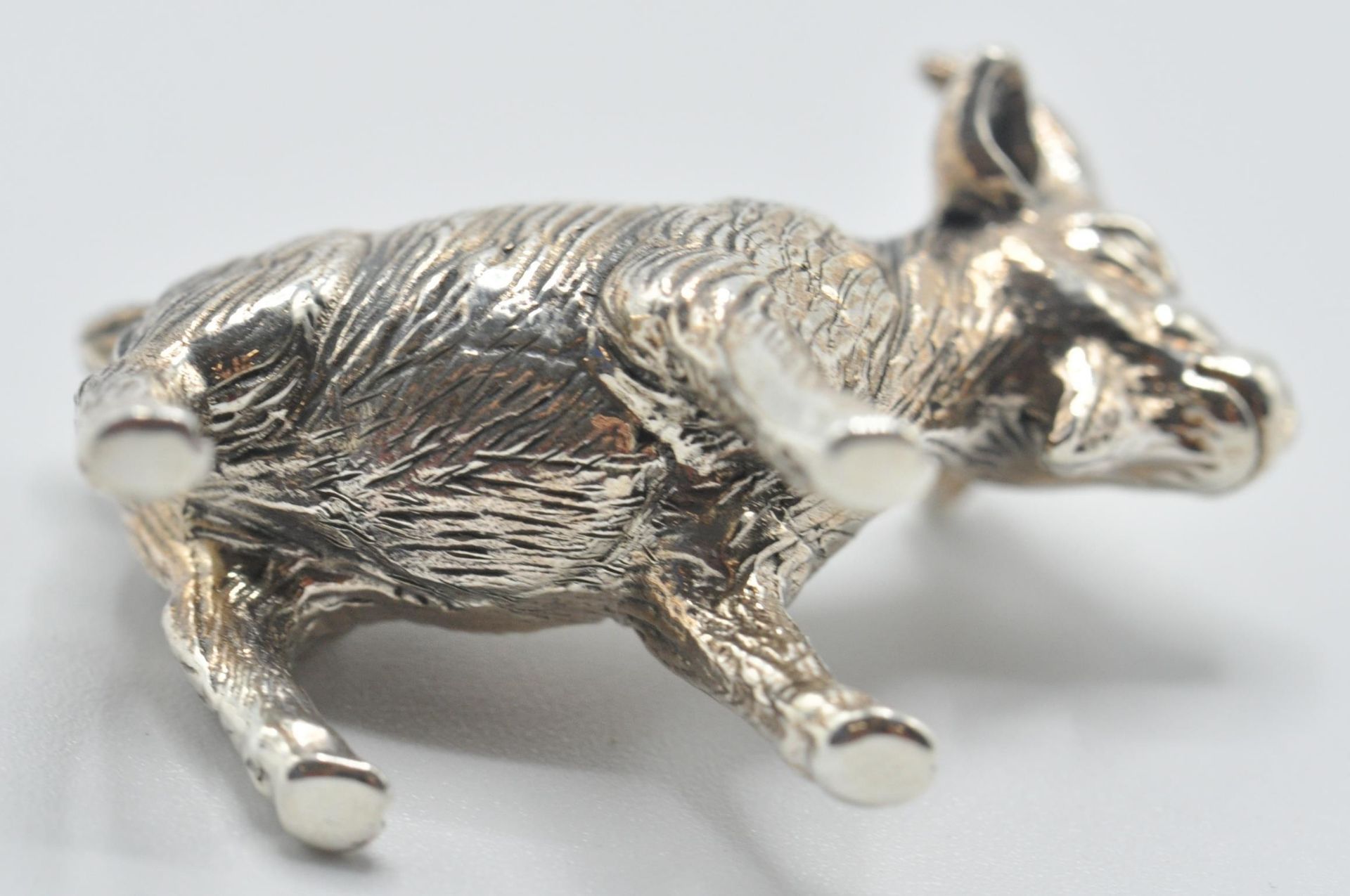 A contemporary sterling silver miniature figurine of a goat. Marked Sterling. Measures: 2cm long, - Bild 6 aus 6