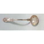 A 19th Century Victorian hallmarked sterling silver ladle having shell and foliate decoration to the
