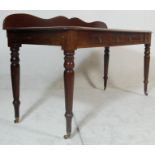 A 19th Century Victorian mahogany buffet de corps / serving table having a serpentine galleried back