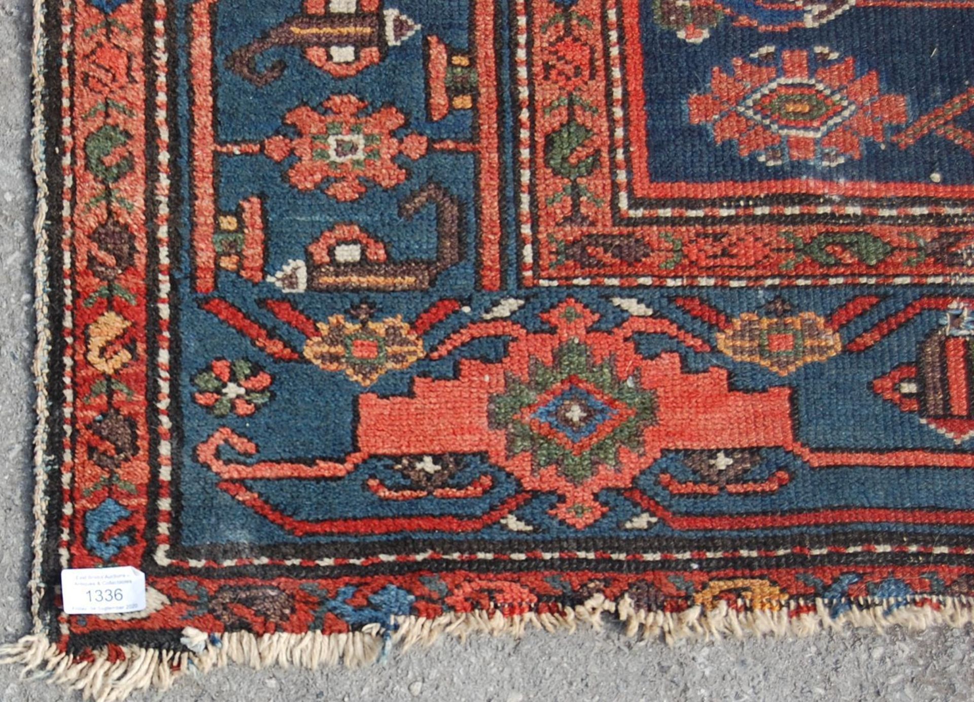 An early 20th century Persian / Islamic Bokhara floor rug – carpet. The rug being handwoven with a - Image 3 of 4