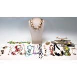 A collection of vintage ladies costume jewellery to include as selection of ladies beaded