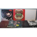 A collection of vintage 12” vinyl rock records to include The Stranglers - live X cert, The